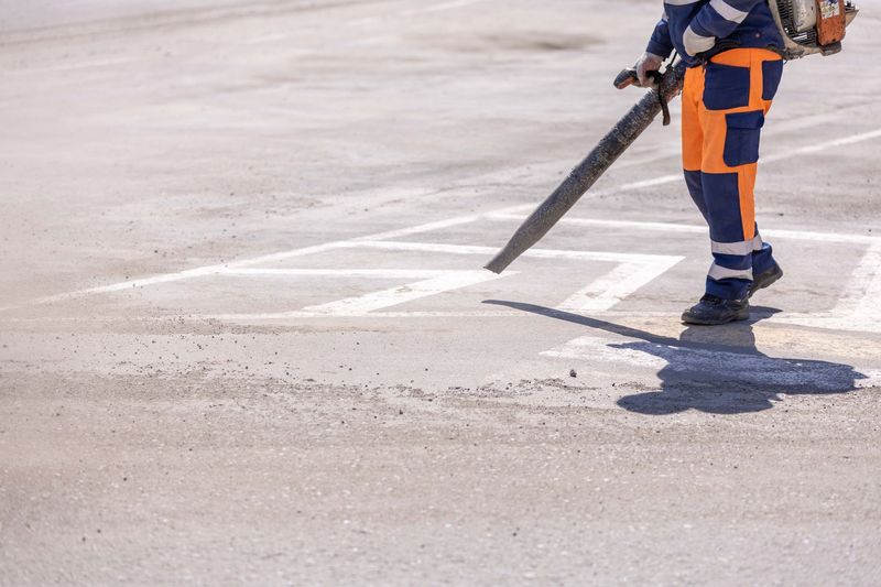 Clean storefront sidewalk after commercial pressure washing